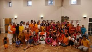 Saffron Day community representatives wearing orange